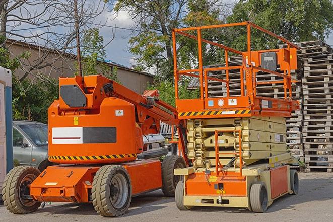 forklift maneuvering through a tidy warehouse environment in Alpine